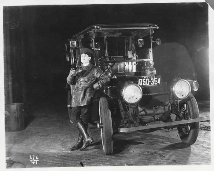 Framed Print : Chauffeur Leaning on Automobile Framed Print : Chauffeur Leaning on Automobile