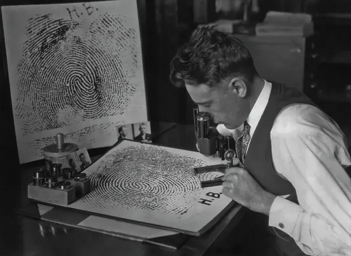 Framed Print : Checking Fingerprints