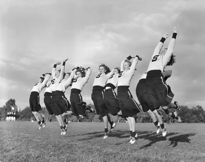 Framed Print : Cheerleaders Jumping in the Air