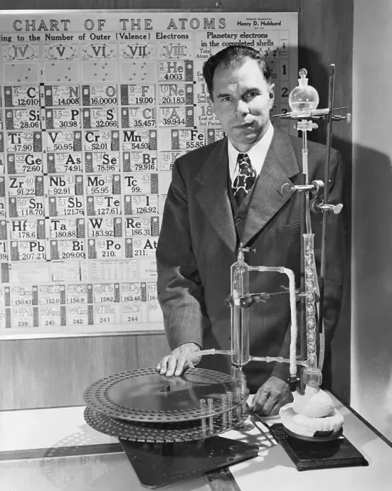Framed Print : Chemist Glenn Seaborg with Element Apparatus