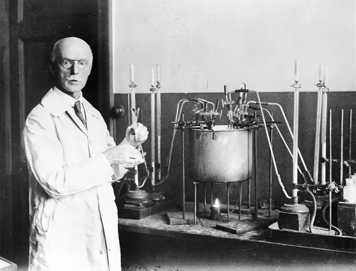 Framed Print : Chemist in His Laboratory