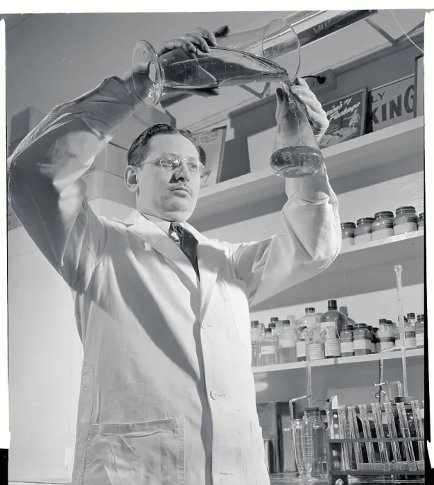 Framed Print : Chemist Trying to Find Perfect Blend for Male Cologne Framed Print : Chemist Trying to Find Perfect Blend for Male Cologne