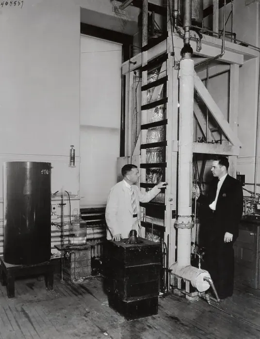 Framed Print : Chemists Examining Columbia Laboratory Scrubbing Column Framed Print : Chemists Examining Columbia Laboratory Scrubbing Column