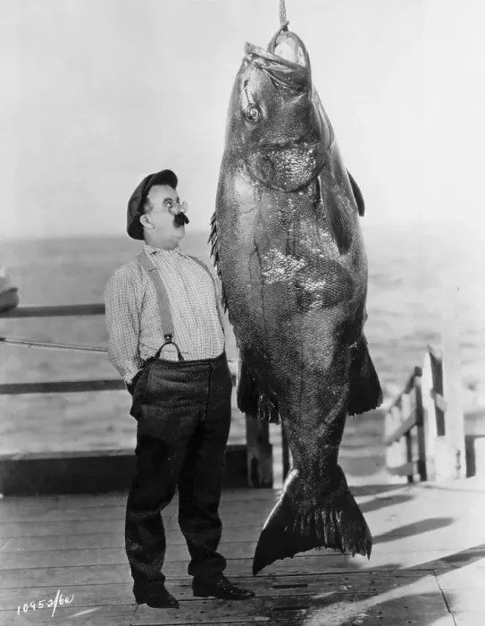 Framed Print : Chester Conklin Stands by Giant Fish