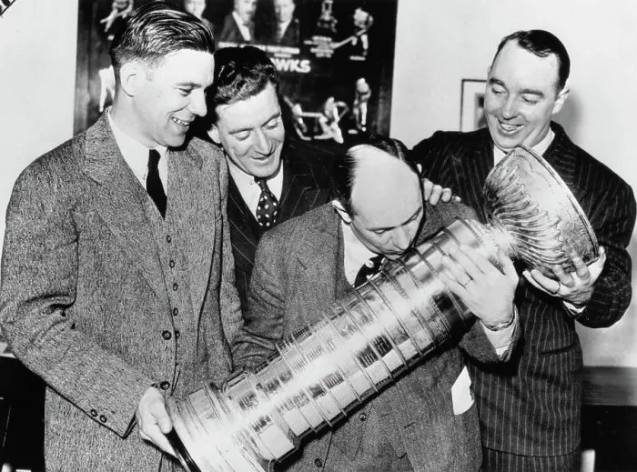 Framed Print : Chicago Black Hawks Manager Kissing Stanley Cup Framed Print : Chicago Black Hawks Manager Kissing Stanley Cup