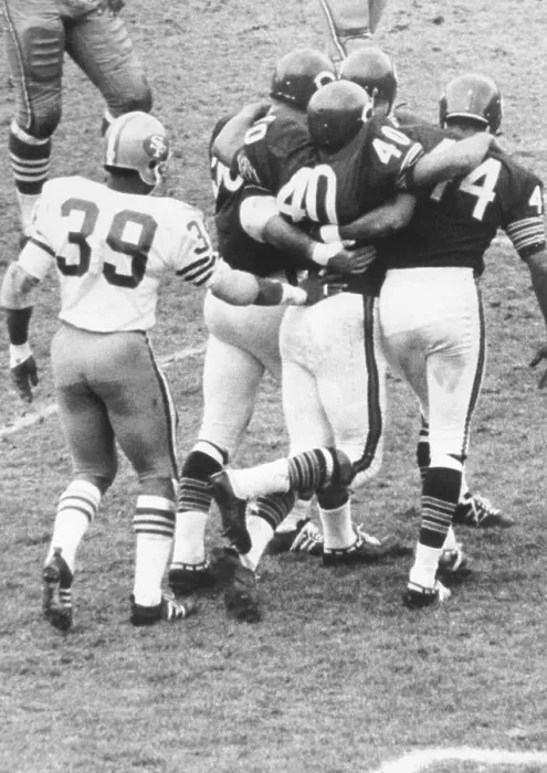 Framed Print : Chicago's Gale Sayers After Being Injured During a Game Against the 49ers Framed Print : Chicago's Gale Sayers After Being Injured During a Game Against the 49ers