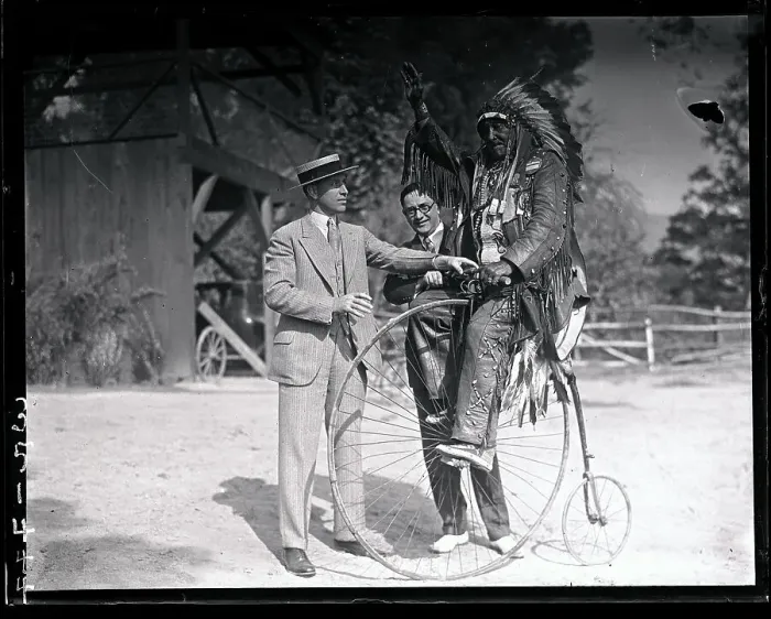 Framed Print : Chief White Horse Eagle Seated on Bicycle Framed Print : Chief White Horse Eagle Seated on Bicycle
