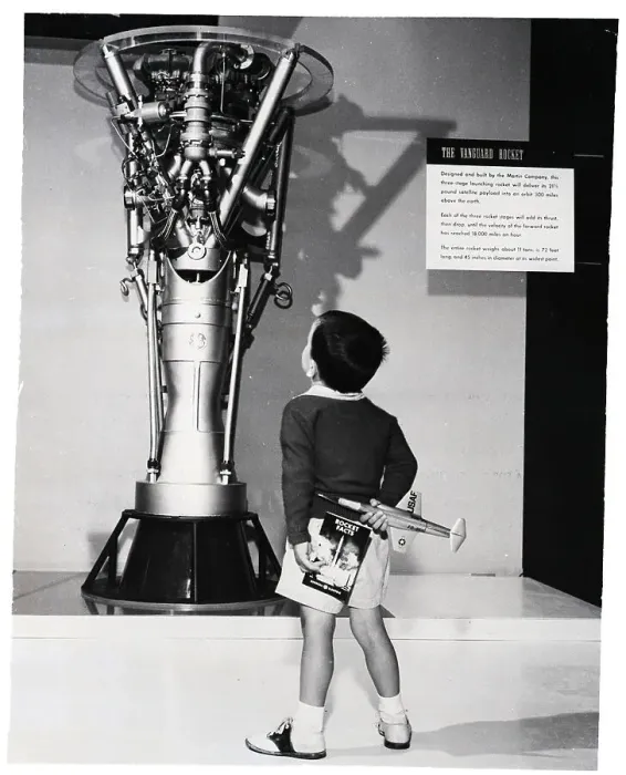 Framed Print : Child Admires The G.E. Rocket Engine Framed Print : Child Admires The G.E. Rocket Engine