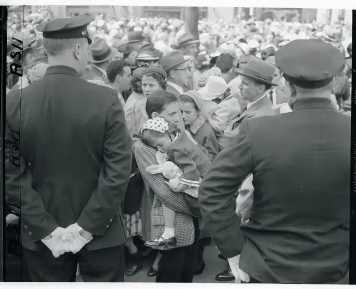 Framed Print : Child Asleep in Crowd Framed Print : Child Asleep in Crowd