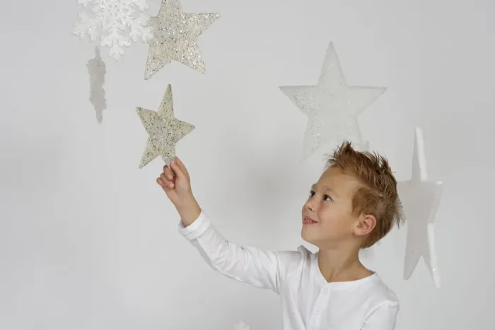 Framed Print : Child, boy wearing an angel costume with stars, Christmas, festive season Framed Print : Child, boy wearing an angel costume with stars, Christmas, festive season