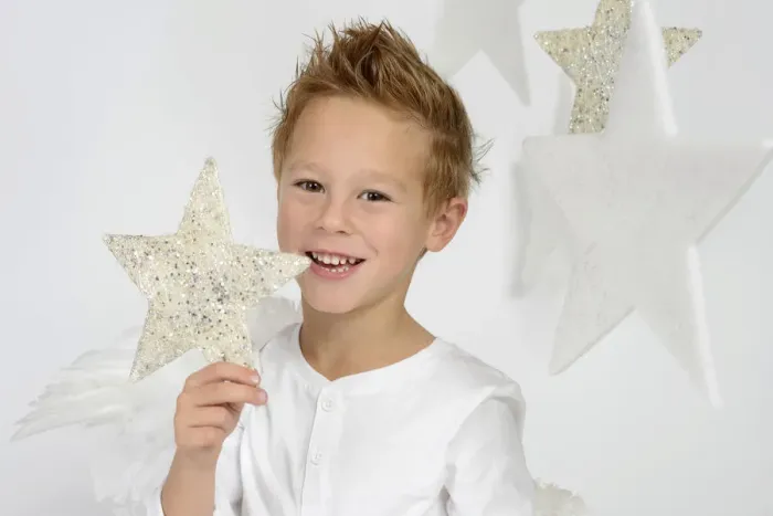Framed Print : Child, boy wearing an angel costume with stars, Christmas, festive season Framed Print : Child, boy wearing an angel costume with stars, Christmas, festive season
