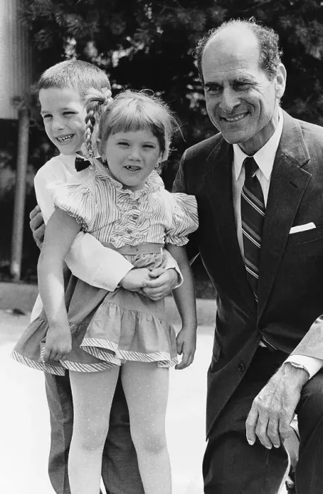 Framed Print : Child Demonstrating Heimlich Maneuver to its Inventor Framed Print : Child Demonstrating Heimlich Maneuver to its Inventor