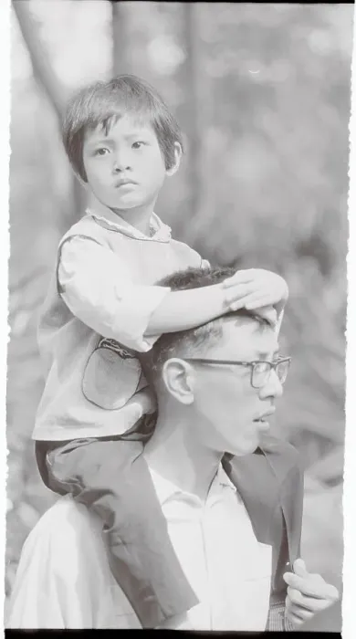 Framed Print : Child on Father's Shoulders Framed Print : Child on Father's Shoulders
