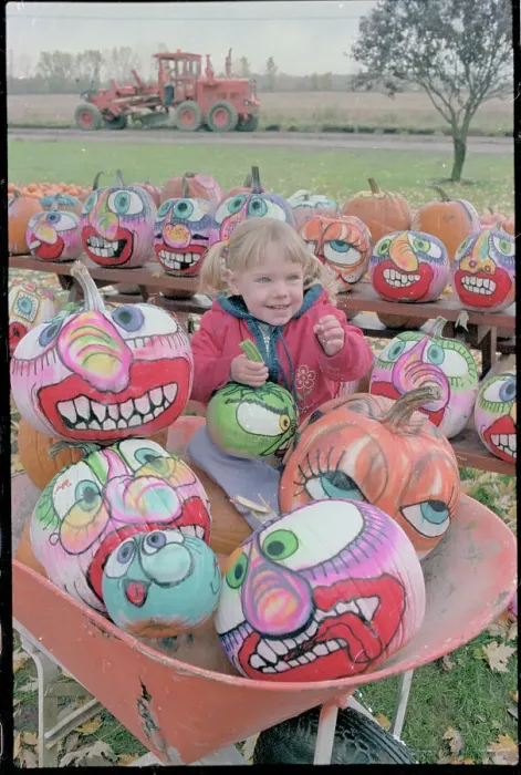 Framed Print : Child with Painted Pumpkins Framed Print : Child with Painted Pumpkins