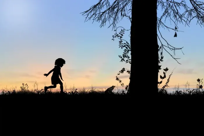 Framed Print : Child playing behind a frog Framed Print : Child playing behind a frog