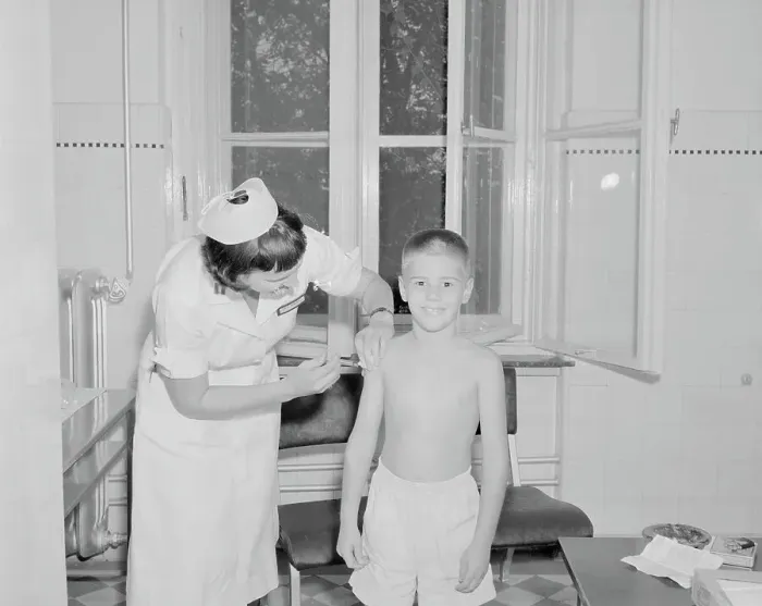 Framed Print : Child Receiving Polio Vaccination Framed Print : Child Receiving Polio Vaccination