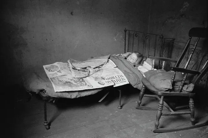 Framed Print : Slum. A child sleeping in a slum dwelling in the backstreets of Liverpool Framed Print : Slum. A child sleeping in a slum dwelling in the backstreets of Liverpool