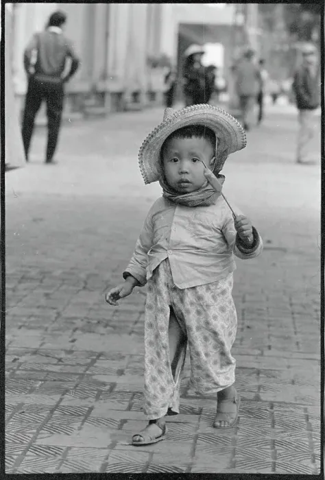 Framed Print : Child Wandering Down Street Framed Print : Child Wandering Down Street