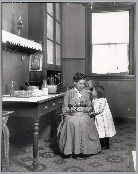Framed Print : Child Watches Mother in Kitchen Framed Print : Child Watches Mother in Kitchen