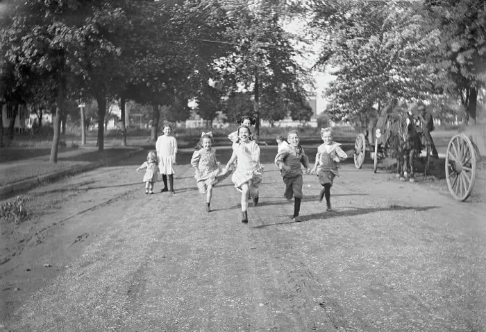 Framed Print : Children (3-12 years) running dirt road. 1925