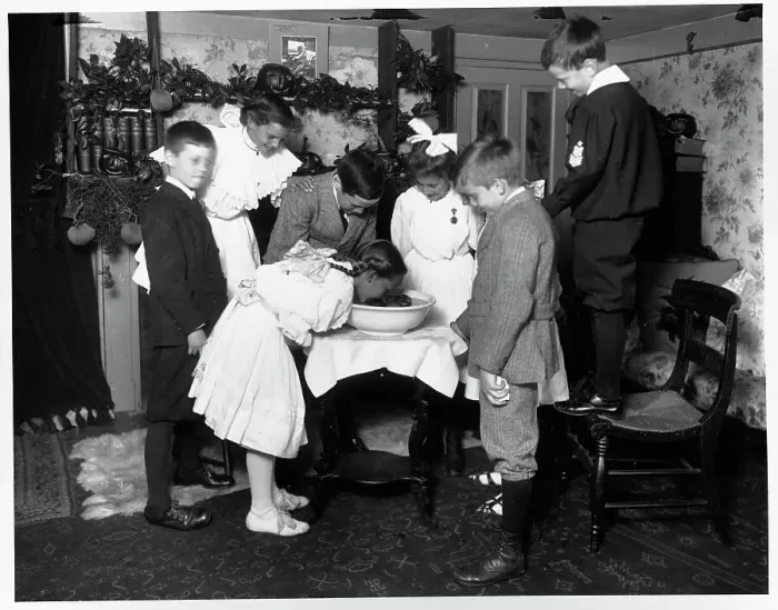 Framed Print : Children Bobbing For Apples On Halloween Framed Print : Children Bobbing For Apples On Halloween