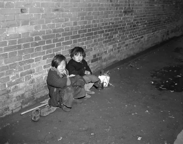 Framed Print : Children Huddled Against A Wall Framed Print : Children Huddled Against A Wall