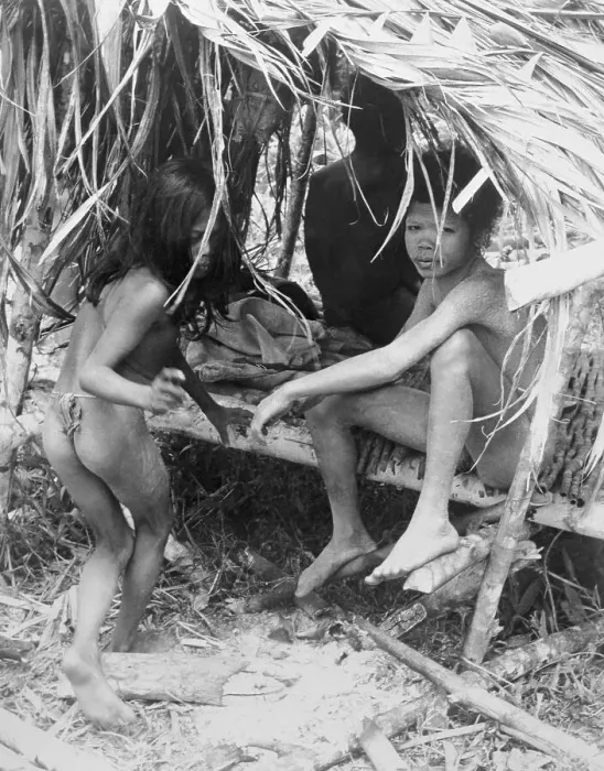 Framed Print : Children Lounging in Hut Framed Print : Children Lounging in Hut