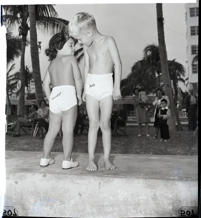 Framed Print : Children Model Hello and Goodbye Swimsuits Framed Print : Children Model Hello and Goodbye Swimsuits
