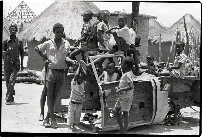 Framed Print : Children Play in Wrecked Automobile Framed Print : Children Play in Wrecked Automobile