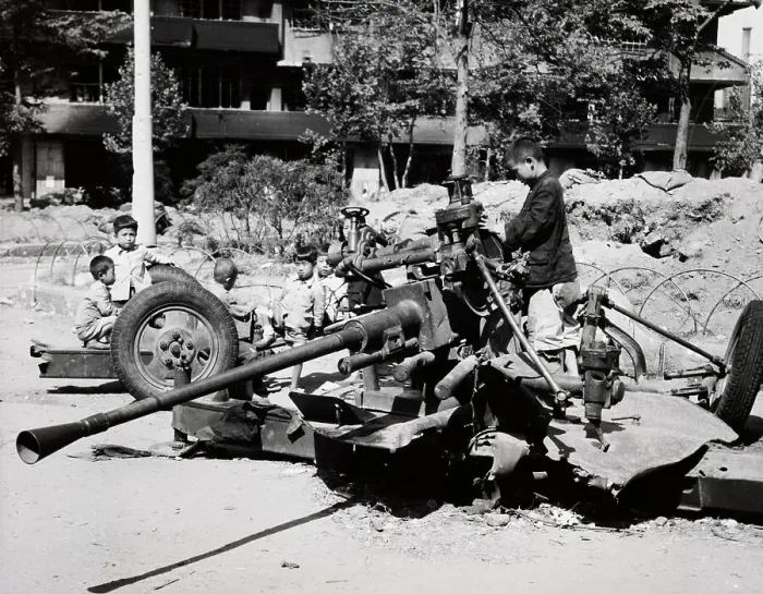 Framed Print : Children Playing On Anti-Tank Gun Framed Print : Children Playing On Anti-Tank Gun