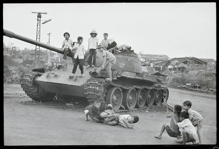 Framed Print : Children Playing with Communist Tank Framed Print : Children Playing with Communist Tank