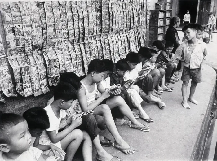 Framed Print : Children Reading Under Row Of Books Framed Print : Children Reading Under Row Of Books