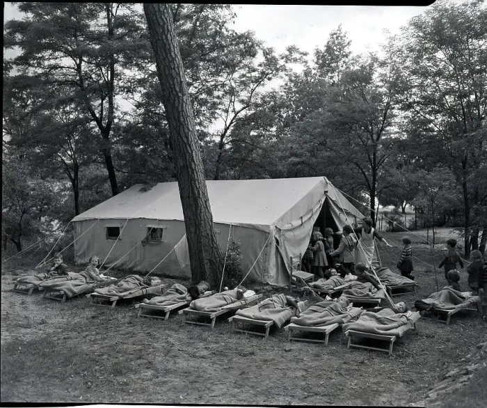 Framed Print : Children Sleep On Cots Outside Of Tent Framed Print : Children Sleep On Cots Outside Of Tent