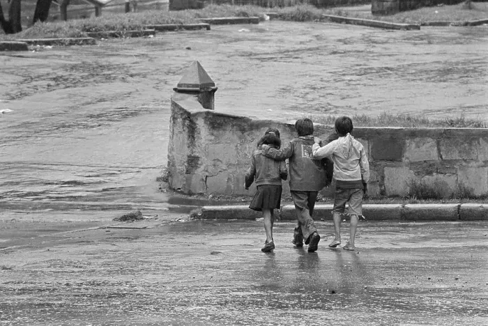 Framed Print : Children Strolling Down a Street Framed Print : Children Strolling Down a Street