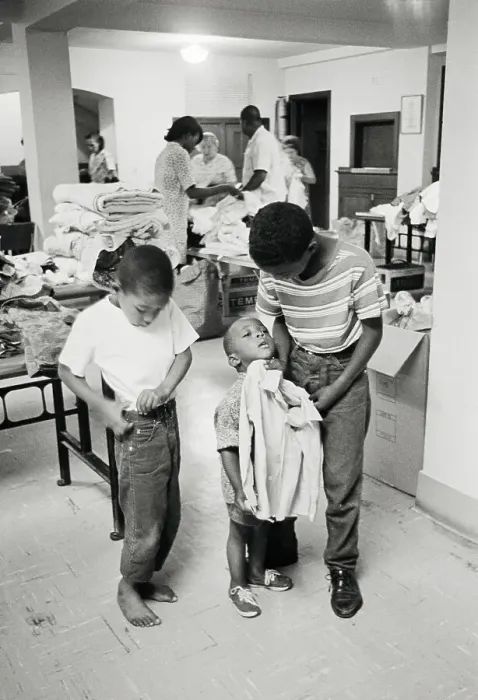 Framed Print : Children Trying On New Clothes Framed Print : Children Trying On New Clothes