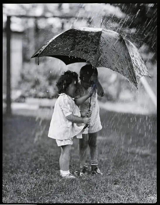 Framed Print : Two Children Under Umbrella During a Downpour Framed Print : Two Children Under Umbrella During a Downpour