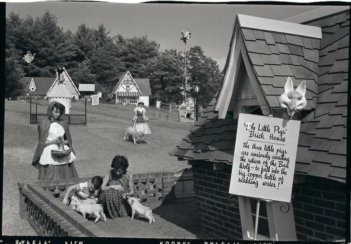 Framed Print : Children Visit Storytown U.S.A. House Framed Print : Children Visit Storytown U.S.A. House