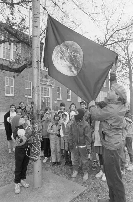 Framed Print : Children Watch as the Earth Day Flag is Raised Framed Print : Children Watch as the Earth Day Flag is Raised