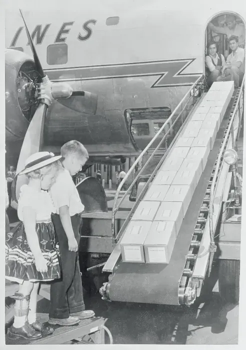 Framed Print : Children Watching Boxes on a Conveyor Belt Framed Print : Children Watching Boxes on a Conveyor Belt