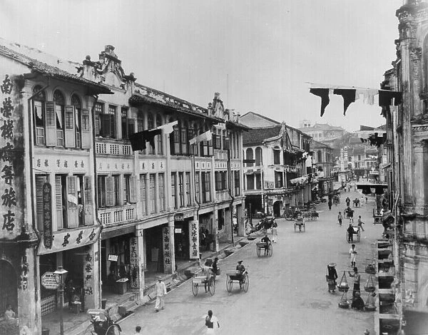 Chinatown. circa 1920: Chinese quarter in Singapore