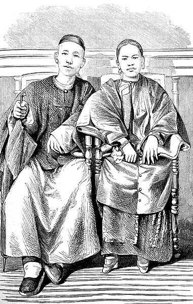 Chinese couple portrait sitting in chair, full length