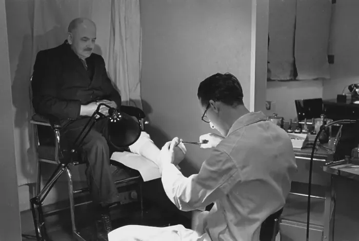 Framed Print : Chiropodist At Work Framed Print : Chiropodist At Work