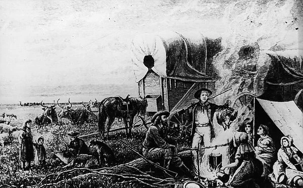 Chow Time. circa 1780: Pioneer settlers with a covered wagon making camp