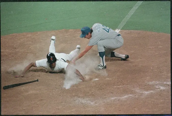 Framed Print : Chris Brown Sliding Home