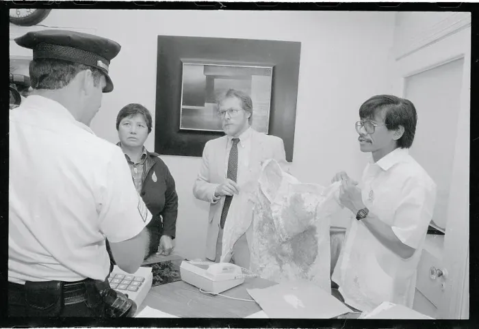 Framed Print : Bill Christeson and Walden Bello Holding Bloody Shirt