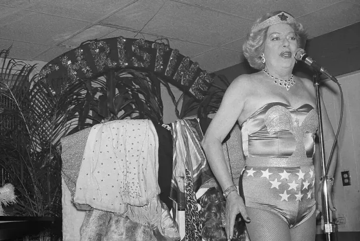 Framed Print : Christine Jorgensen in Skimpy Attire and Singing at Microphone Framed Print : Christine Jorgensen in Skimpy Attire and Singing at Microphone