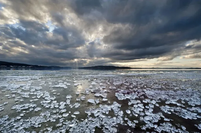 Framed Print : Chunks of ice lying on icy surface on the shore of Reichenau Island, Baden-Wuerttemberg, Germany, Europe Framed Print : Chunks of ice lying on icy surface on the shore of Reichenau Island, Baden-Wuerttemberg, Germany, Europe