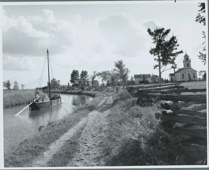 Framed Print : Church and Boat on Canal Site Framed Print : Church and Boat on Canal Site