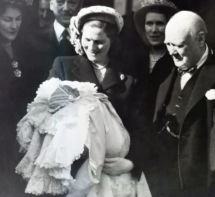 Framed Print : Churchill Admimres Grandson In Mom'S Arm