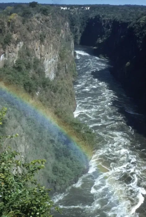 Framed Print : Circa 1955, A rainbow arcs over the gorge of Victoria Falls on the Zambezi River Framed Print : Circa 1955, A rainbow arcs over the gorge of Victoria Falls on the Zambezi River